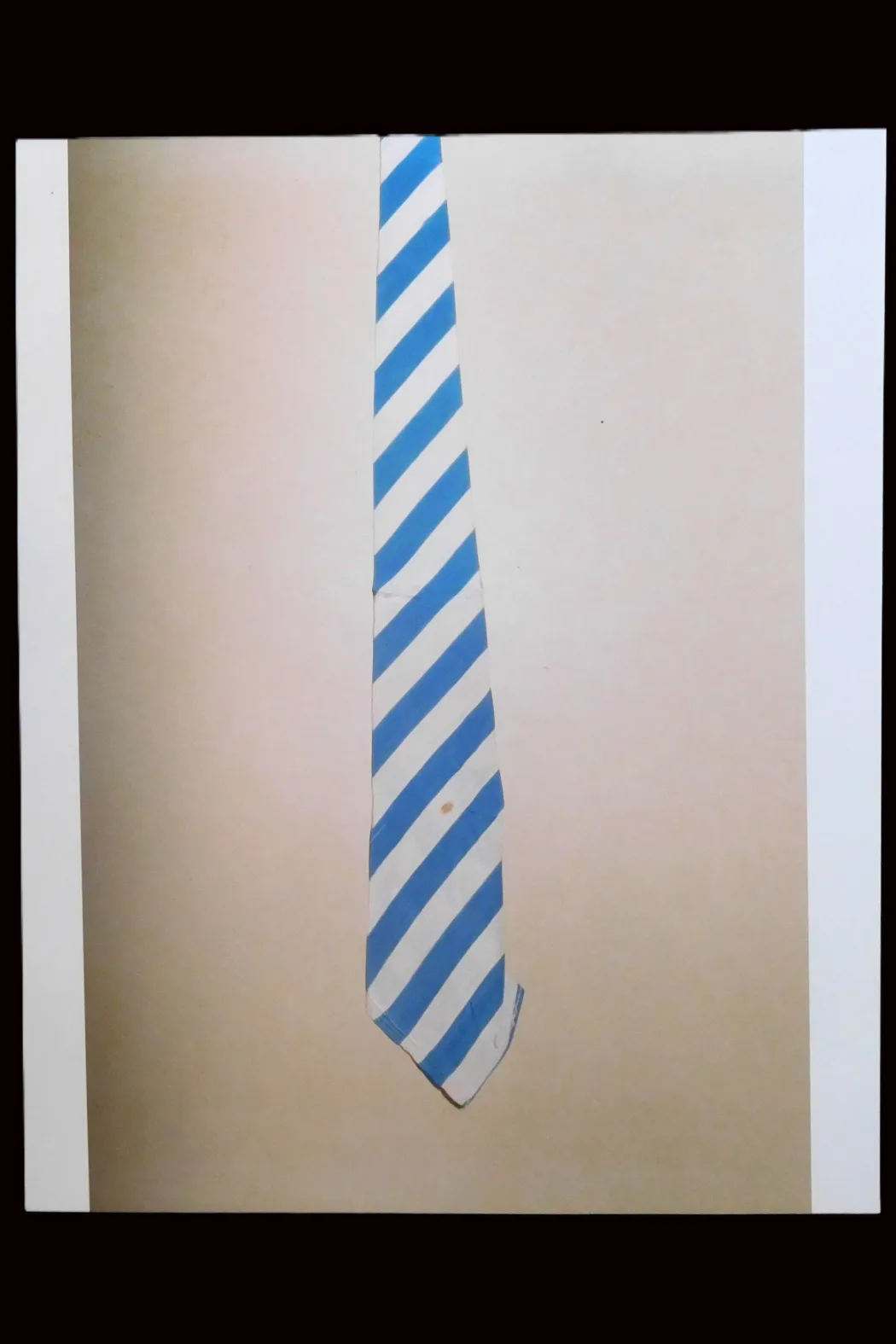 Colour photo of tie given to Paul Leon by JJ